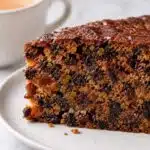 boiled fruit cake recipe sliced showing dense moist fruit-packed interior