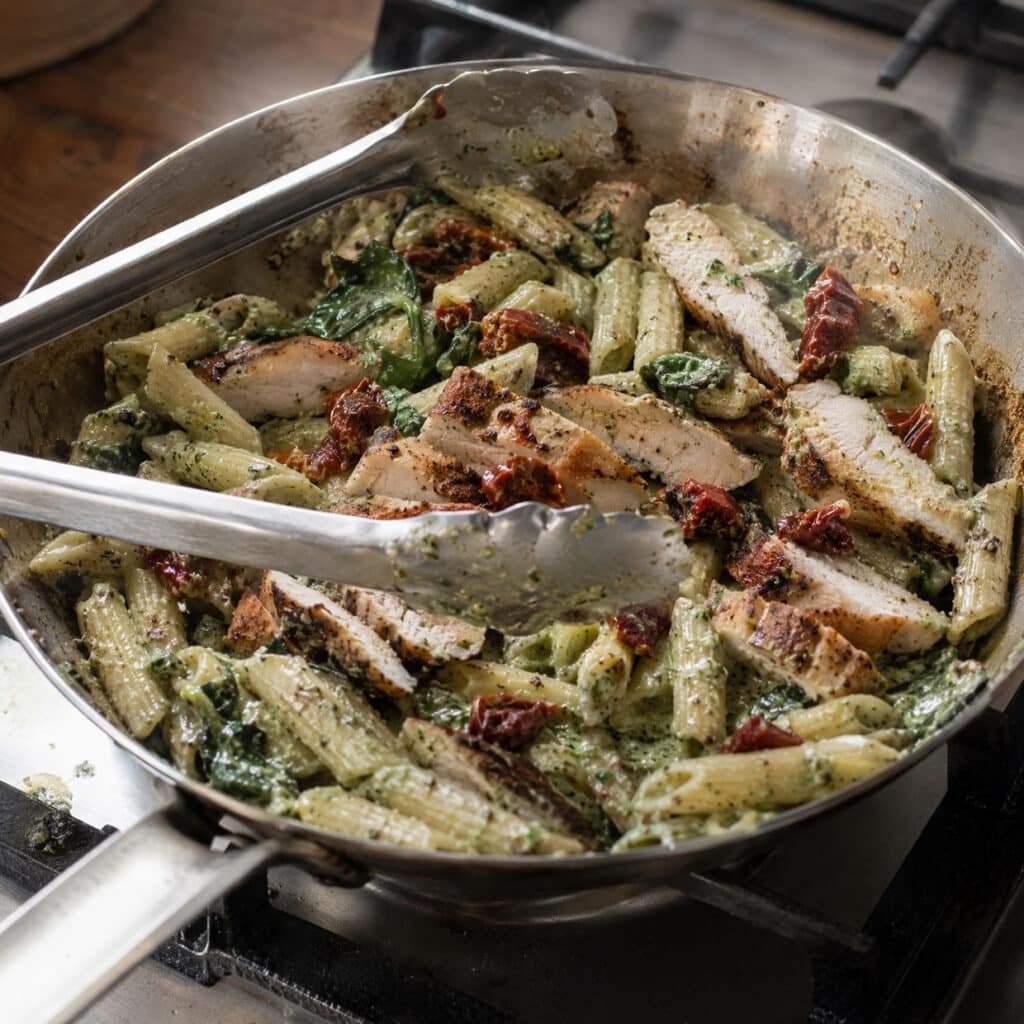 creamy pesto pasta with chicken and sun-dried tomatoes